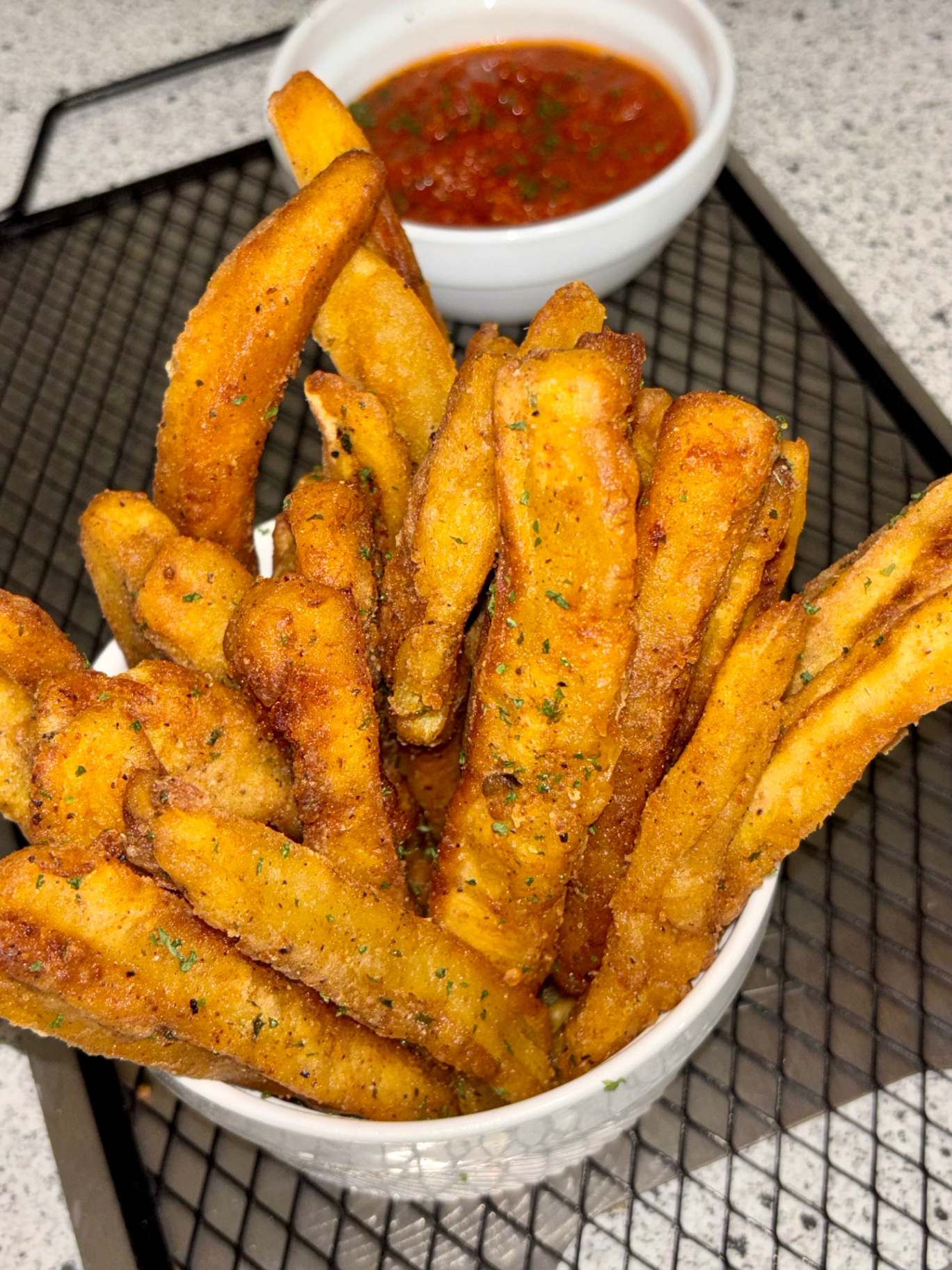 Caribbean plantain fries served with red dipping sauce