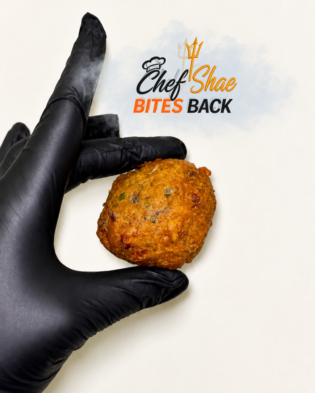 Chef Shae holding a fresh Bajan fish cake