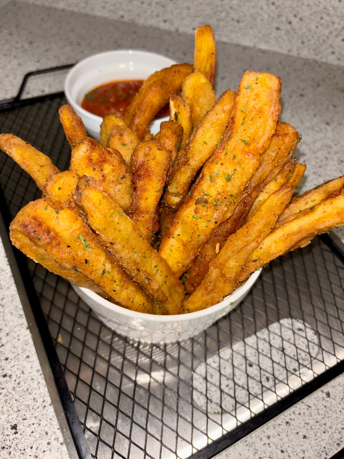 Plantain fries finished with Chef Shae's seasoning blend