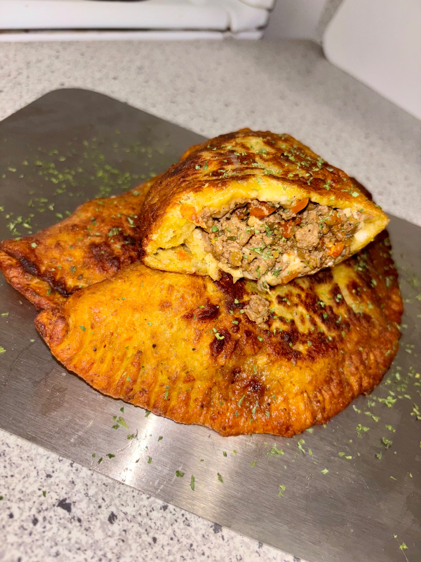 Plantain beef patties fresh off the pan